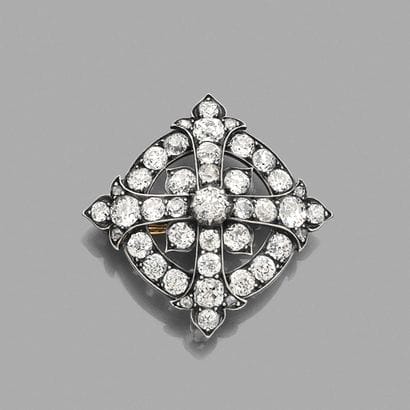 Pendentif-broche 
en argent et en or 18K...