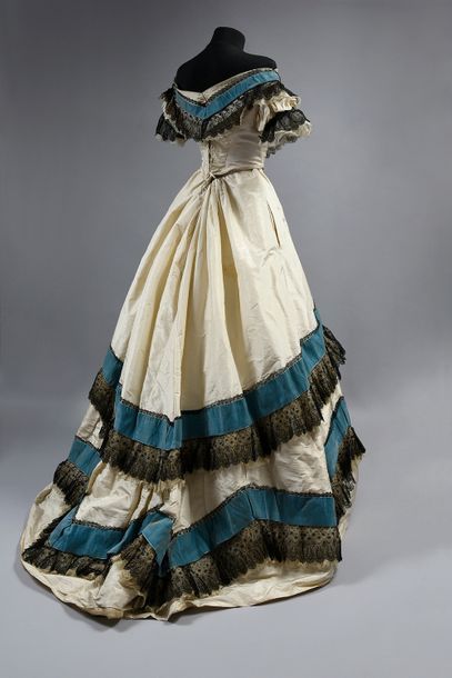 Ball gown, circa 1865, dress in cream silk...