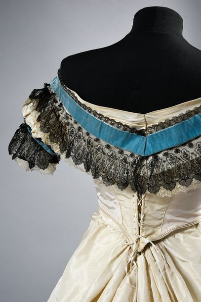 Ball gown, circa 1865, dress in cream silk...