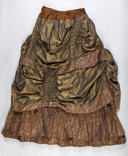 Daytime dress, circa 1885, in green striped...