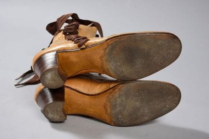 Pair of lace-up boots with the J Marchés...