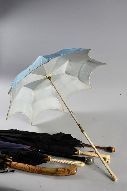 Set of five umbrellas circa 1900, two with...