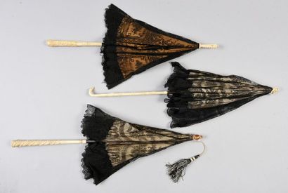 Three umbrellas with pavilions in black mechanical...