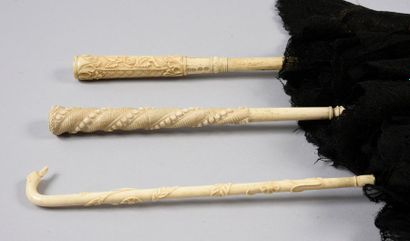 Three umbrellas with pavilions in black mechanical...