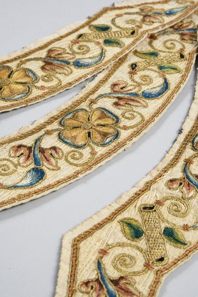 Combination of appliqué and needlepoint embroideries...