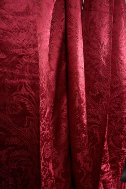 Pair of raspberry brocatelle curtains, first...