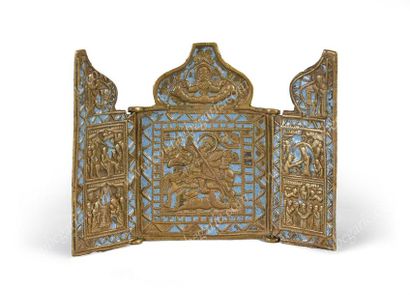ICÔNE TRIPTYQUE DE VOYAGE.
En bronze doré,...
