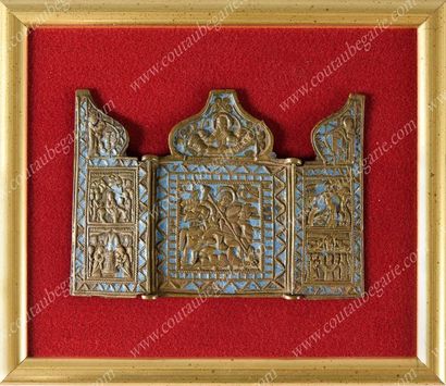 ICÔNE TRIPTYQUE DE VOYAGE.
En bronze doré,...