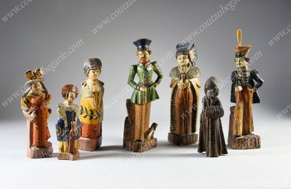 LA NOURRICE.
Figurine en bois sculpté peint,...