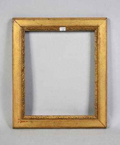 Carved and gilded wood frame.

Louis XVI...
