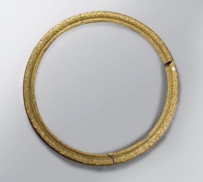 Round gilded carved wood frame called tondo...