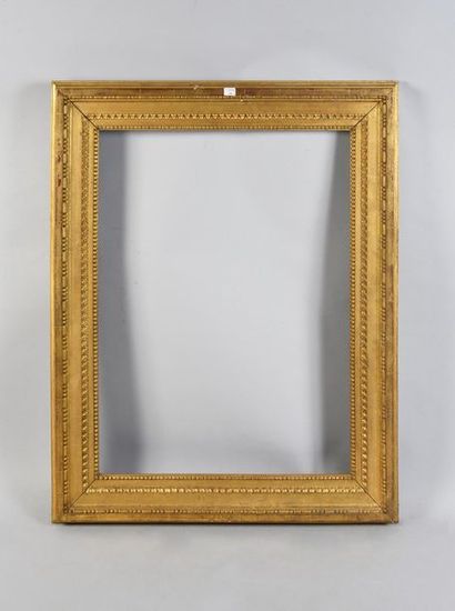 Carved and gilded oak frame with pearl and...