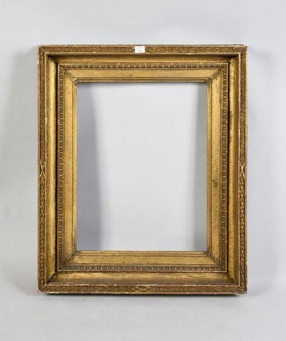Wooden frame and gilded paste said to have...