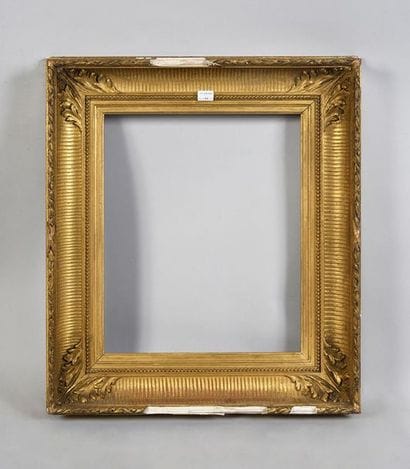 Wooden frame and gilded stucco with 