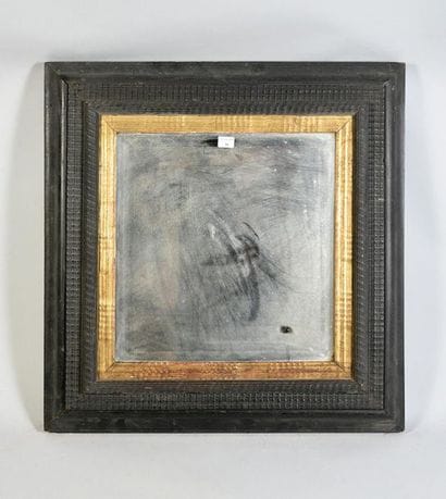Blackened wooden frame and gilded rabbets...