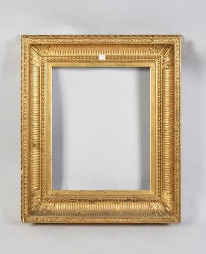 Wooden frame and gilded stucco called 