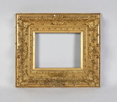 Very beautiful wooden frame and gilded stucco...