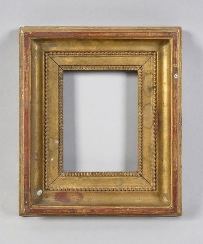 Carved and gilded oak frame with heart and...