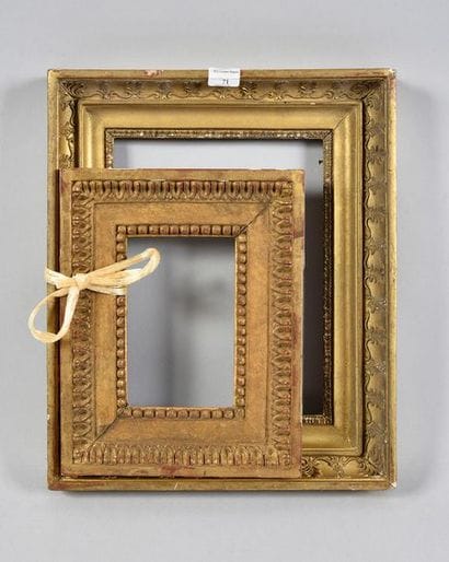 Set of two gilded wood and paste frames,...