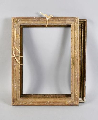 Set of two carved wooden frames formerly...