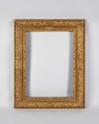 Carved and gilded oak frame with Bérain decoration.

Louis...