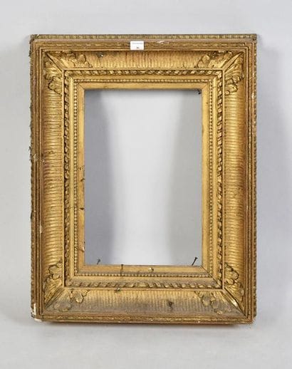 Wooden frame and gilded stucco called 