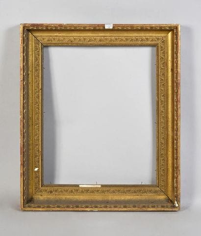 Wooden frame and gilded pate with elegant...
