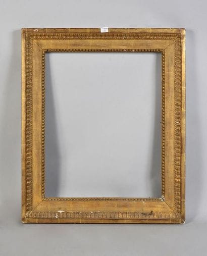 Carved and gilded wooden frame with heart...