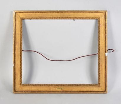 Carved and gilded oak frame with heart and...