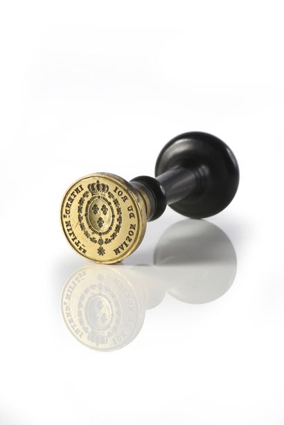 Wax seal.
Engraved in the center of the arms...