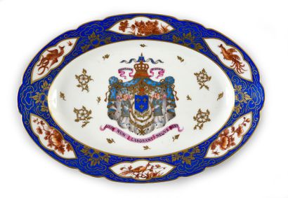 LARGE DECORATIVE DISH. 
 In porcelain, oval...