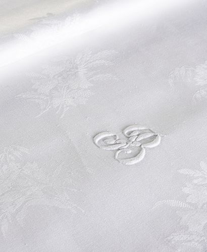 Three damask tablecloths, beginning of the...