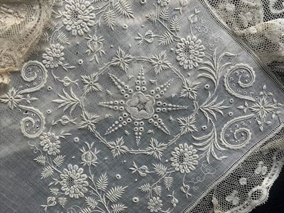 Four embroidered handkerchiefs, 19th century....