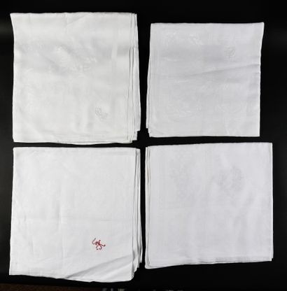 Four damask tablecloths with floral motifs,...