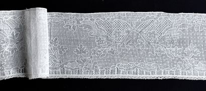 A border in drawn and embroidered threads,...