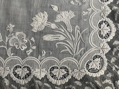 Two embroidered handkerchiefs, mid-19th century.
In...