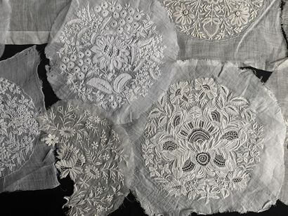 Sixteen bonnet bottoms in white embroidery,...