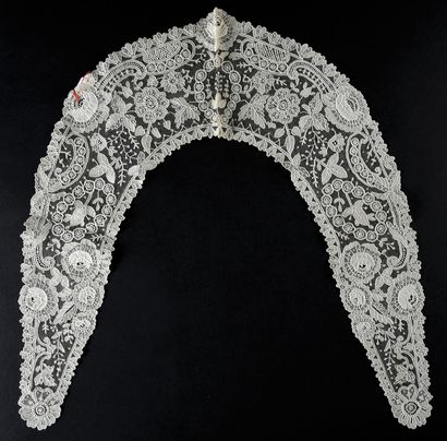 Seven lace collars, needlepoint and bobbins,...