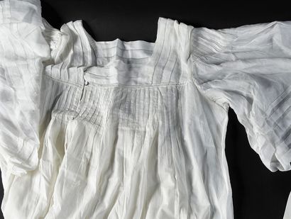 Seven women's nightgowns, late 19th century.
In...
