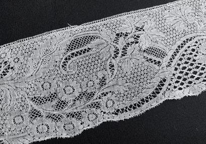 A border in drawn and embroidered threads,...