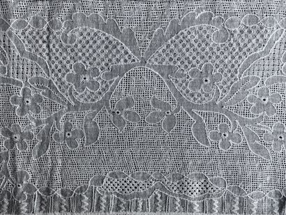 A border in drawn and embroidered threads,...