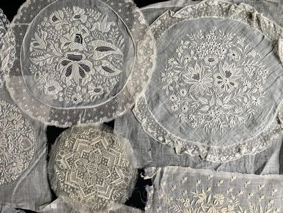 Sixteen bonnet bottoms in white embroidery,...
