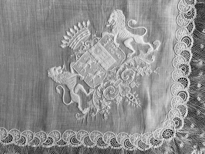 Embroidered handkerchief with the coat of...
