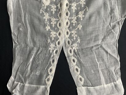 Elements of women's costume in white embroidery,...