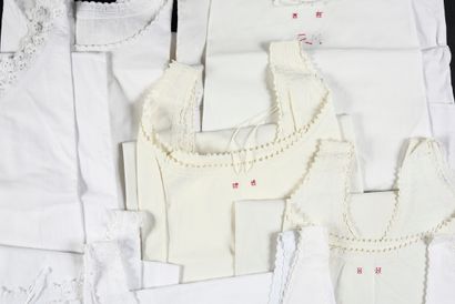 Fourteen women's day shirts, early 20th century.
Sleeveless...