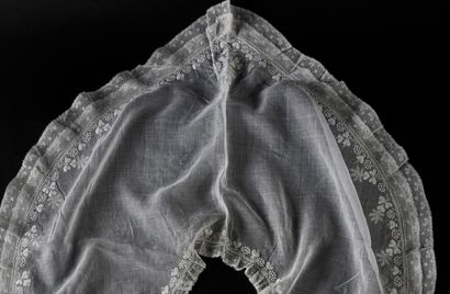 Four white embroidered collars, 19th century.
In...