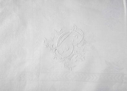 Four damask tablecloths with floral motifs,...