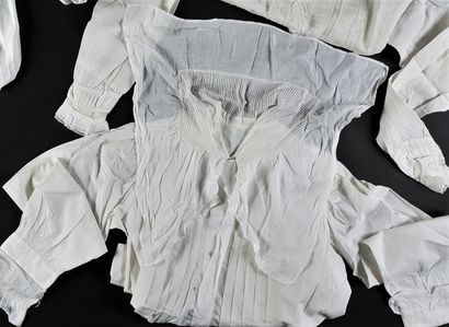 Seven women's nightgowns, late 19th century.
In...