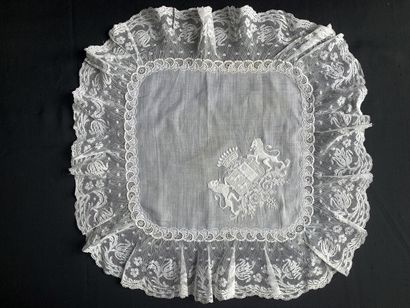 Embroidered handkerchief with the coat of...