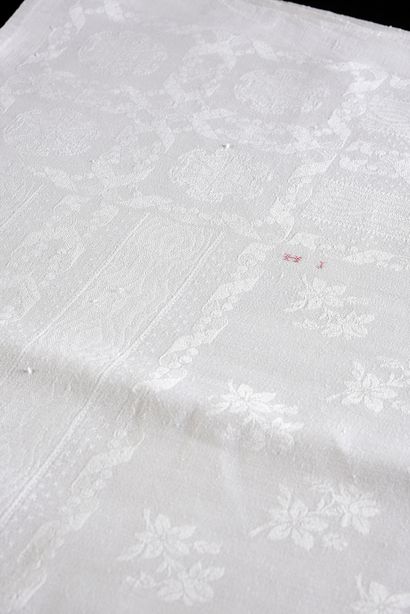 Three damask tablecloths, beginning of the...